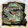 Square silk scarf featuring a black base with yellow borders and tropical feather print - Black