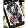 Silky paisley scarf in navy and pink featuring sophisticated geometric prints - Navy Blue