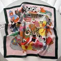 Detailed view of pink silk scarf featuring cartoon cat illustrations with green borders - Pink & Green Fun Cat Style (5) / 70x70cm