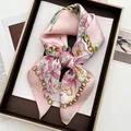 Elegant pink tulip and gold chain print silk scarf on a magazine for a stylish look - Pink Tulip Chain Style (12)