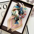 Detail of floral printed silk square scarf with colorful patterns in a gift box - Champagne Base Floral Stripe Style (27)