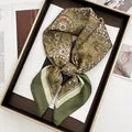Olive green paisley square silk scarf for women elegantly displayed on a tray - Olive Green and Beige Paisley Style (25)