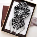 Detail of silk-feel scarf with geometric pattern presented in a luxury gift box - 70*70cm / Silver Gray Geometric (37)