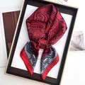 Macro shot of red paisley satin scarf neatly folded in a premium gift box packaging - 70*70cm / Red Purple Paisley (30)