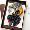 Elegant multi-color geometric silk scarf featuring modern patchwork and classic patterns - Green