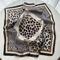Classic square silk scarf with leopard and zebra animal prints and black borders - Black
