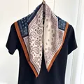 Close-up of paisley print scarf with navy and caramel color block and silk-like texture - Beige Blue Brown Patchwork Paisley Style (Style 4)