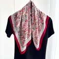 Detailed close-up of a vintage red paisley scarf with elegant silky texture and rich colors - Red Border Colorful Paisley Style (Style 2)