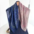Detail of paisley pattern silk scarf with vintage contrast colors on wooden hanger - Blue Taupe Patchwork Paisley Style (Style 25)
