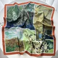 Detailed view of square silk scarf featuring Van Gogh art prints and orange rolled edges - Green