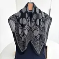 Detail of a black cotton linen square scarf with intricate white lace floral patterns - Black White Geometric Floral Style (Style 20)