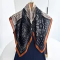 Detailed view of herringbone and paisley pattern on a retro color-block square silk scarf - Black Beige Retro Paisley Style (Style 17)