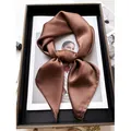 Elegant dark brown satin silk square scarf with a glossy finish and tied knot style - Caramel color