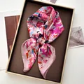Detailed view of pink floral silk scarf with hand-painted patterns in a brown gift box - 70*70cm / Pink Abstract Floral (31)