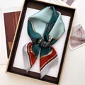 Close-up of silk square scarf showing paisley pattern, chain details, and satin texture - Contrast Belt Buckle (15)