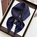 Navy blue square silk scarf with paisley patterns on a luxury display tray - Navy Blue Teardrop Style (7)