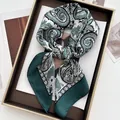 Vintage green paisley silk scarf with satin finish displayed on elegant background - Paisley Pattern / Green