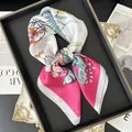 Floral silk square scarf with vibrant bird print and pink border on a luxury display - Pink Border Floral Bird Style (23)