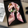 Elegant pink floral silk scarf with vintage rose print displayed on a luxury black tray - Pink
