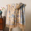 Detail of floral jacquard thick scarf with camel and blue tones and fringe edges - Sky Blue