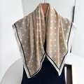 Detailed view of beige polka dot scarf with contrasting black and white borders - Khaki White Large Polka Dot Style (Style 10)