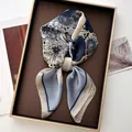 Detailed close-up of floral silk scarf with polka dots in blue and white in a gift box - 70*70cm / Navy Vintage Floral (34)