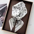 Elegant paisley star pattern silk scarf in white and black on a display tray - White Black Grey Star Floral Paisley Style (34)