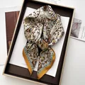Detail of luxury paisley floral satin silk scarf folded in a premium dark gift box - Vintage Floral Pattern (7) / Cream
