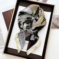 Detailed view of floral silk scarf with checkerboard pattern on a wooden tray - Champagne Checkerboard Floral Style (9)