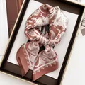 Vintage paisley print silk scarf in reddish-brown and beige on a wooden tray - Red Brown and Beige Paisley Style (12)