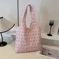 Pink bubble textured tote bag with small black patterns and feminine bow style - Pink