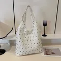 White pleated tote bag with black embroidery and wide shoulder strap for women - White