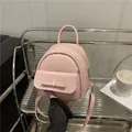 Pink puffy bow backpack for women with adjustable straps and top handle in a lifestyle setting - Pink