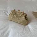 Chic gold woven seashell bag with round metal handle and classic clasp closure - Khaki