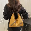 Minimalist yellow herringbone woven tote bag with diagonal zipper and leather straps - Yellow