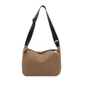 Minimalist tan nylon crossbody bag with wide black strap and white triangle zipper pull - Khaki