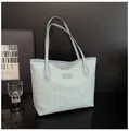 Light blue woven leather tote bag with slim shoulder straps and large capacity - Blue