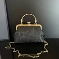 Vintage-Abendtasche aus schwarzem Jacquard mit Blumenmuster und Goldverzierung - Schwarz