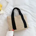 Handmade straw tote bag with black fabric handles and natural V-shaped woven pattern - Black