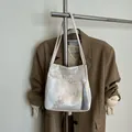 Creamy white satin tote bag with traditional Chinese floral jacquard and grey tassel charm - One Size / Traditional Painting White