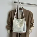Cream-white shoulder bag featuring light blue bamboo jacquard and a long grey tassel charm - One Size / Bamboo Leaf White