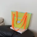 Neon mesh beach tote bag with orange handles and large storage capacity for travel - Fluorescent Green
