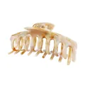 Detail of yellow marble claw clip with golden metal spring for elegant hair styling - Amber Marble