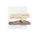 Detail of beige wavy and grey marble acetate hair clips on a white display card - Beige Wave And Gray Terrazzo Clips