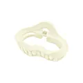 Detailed close-up of a matte cream white hair claw clip with a wavy hollow design - Off-White Hollow Cloud Style