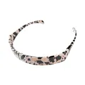 Dettaglio dei denti antiscivolo sul cerchietto pieghevole in resina con trama marmo rosa - Marmo Rosa Nero Bianco