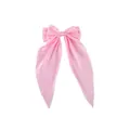 Detailed view of the smooth pink satin fabric and large bow texture on the hair clip - Light Pink