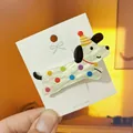 Pinza para el pelo de perro en acrílico con lunares de colores y gorro de fiesta - Pinza Pico de Pato Perro con Manchas Multicolor