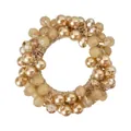 Close-up of champagne beaded hair tie with rhinestones and faux pearls for ponytail - Light Coffee