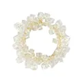 Macro shot of sparkling square crystal beads on a cream elastic hair tie band - White Rhinestone Hair Tie